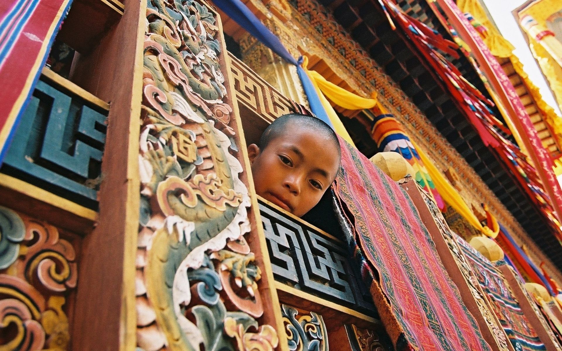 Young monk at Punakha Dhong 2003 from filming of Story of an English Stupa photo by Judi Alston